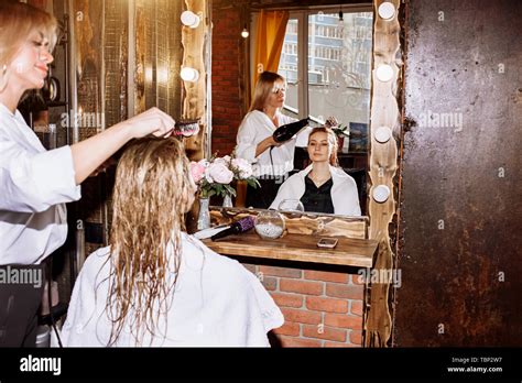 Beautiful Hairstyle Of Young Woman After Dyeing Hair In Beauty Salon