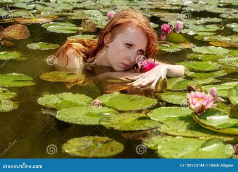 Sensual Young Redhead Woman Mermaid Swims Plays Sensitively Seductive