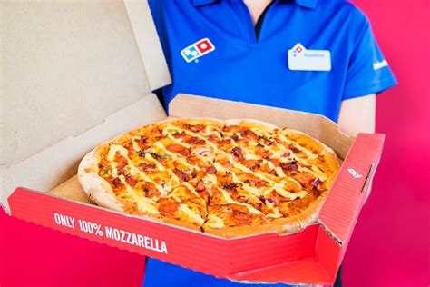 uitbaters dominos pizza slepen moederbedrijf voor de rechter  conflict  machtsmisbruik