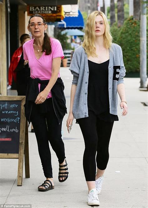 elle fanning spends quality time with her mother as they enjoy a day of retail therapy in los
