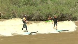 water phenomenon brings surfers to river video