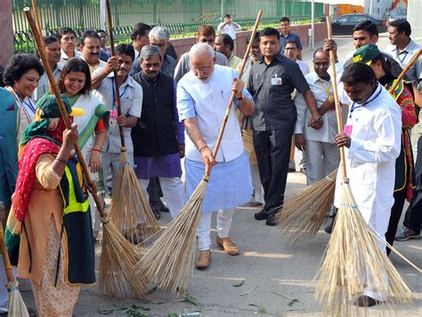 indias modi wields broom  drive  clean  filthy cities nbc news