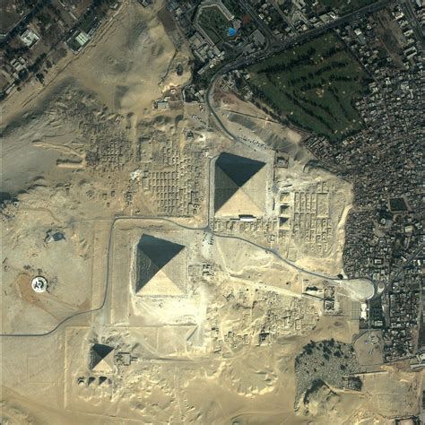 robot cosmonaut pyramids  giza egypt great pyramid  giza