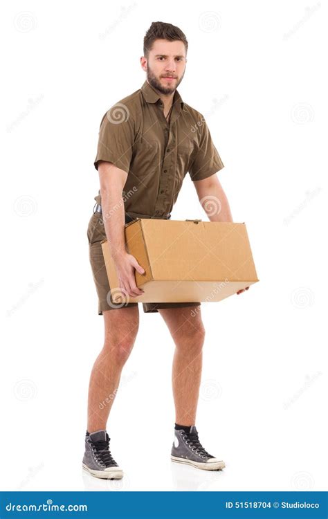 courier holding  heavy package stock photo image   expression