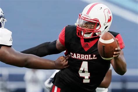 archbishop carroll overwhelms west catholic behind quarterback russell