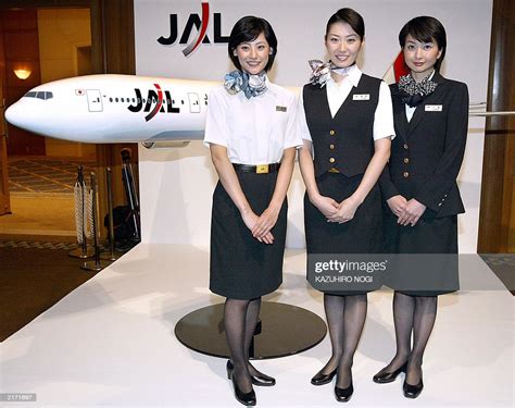 Japan Airlines Systems Flight Attendants Wearing Newly