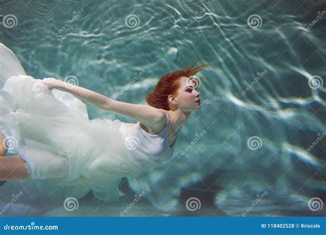 Underwater Girl Wearing Bikini In Swimming Pool Royalty Free Stock