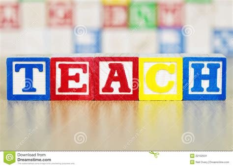 teach spelled out in alphabet building blocks stock image