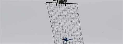 tokyos drone squad  deploy  foot drones armed  nets  police  sky ars technica