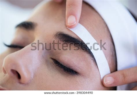 woman   eyebrows shaped spa stock photo  shutterstock