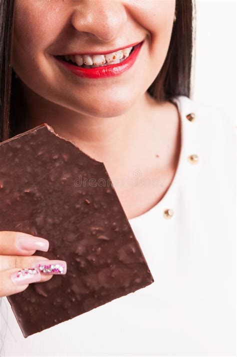 Crazy For Chocolate Young Woman With Smeared Tooth From Chocolate Bar