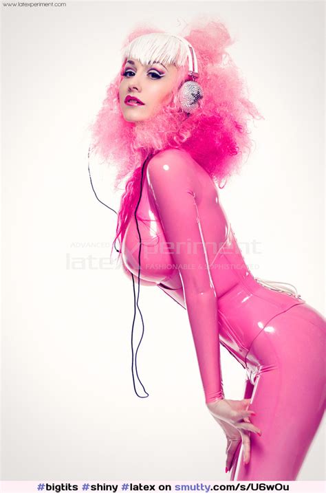 shiny latex latexcatsuit corset pink latexperiment bigtits