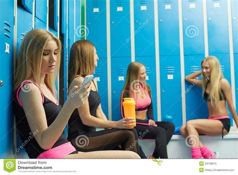 Athletic Girls Having Fun In Locker Room Stock Image