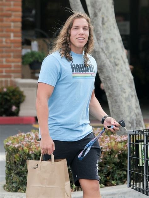 arnold schwarzenegger son is jacked and hanging loose