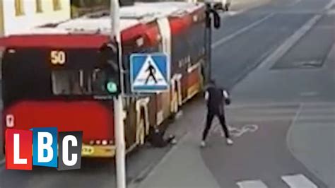 Terrifying Moment Girl Is Pushed Into A Passing Bus As A Friend S