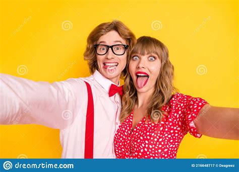 Photo Portrait Of Lovely Couple Fooling Showing Tongue On Valentines