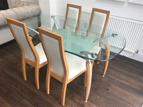 seater glass dining table  wirral merseyside gumtree