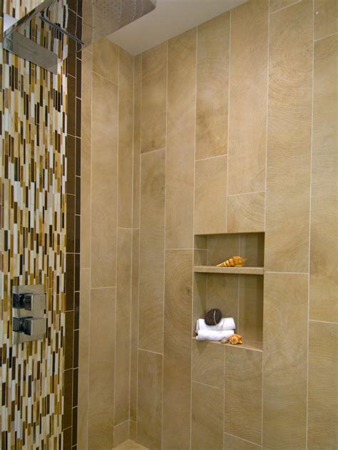 modern shower  vertical mosaic tiles  wall niche hgtv