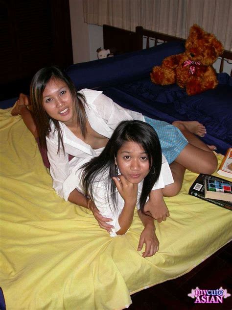 two naked asian lesbians posing and kissing ass point