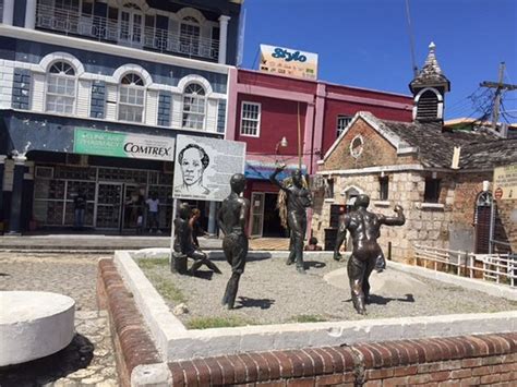 Town Square In Montego Bay Monument Depicting A Local