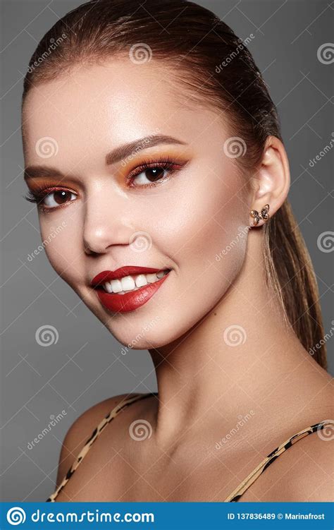 Beautiful Woman With Professional Makeup Party Gold Eye