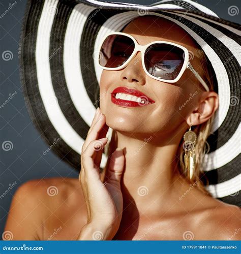 Fashion Portrait Of Cute Woman In Hat And Sunglasses Close Up