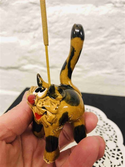ceramic cat figurine sculpture numonday