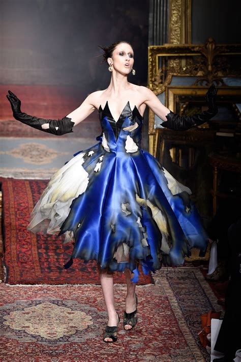 Anna Cleveland And Dresses On Fire At The Moschino Fall