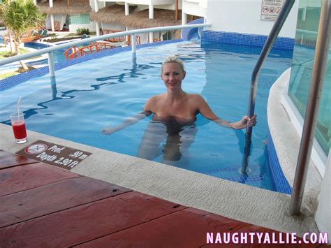 naughty allie gets fully nude at a public swimming pool