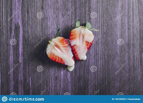 sex concept with strawberries on purple table stock image image of
