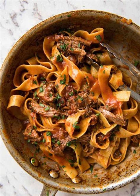 slow cooked shredded beef ragu pasta delicious cuisines   world