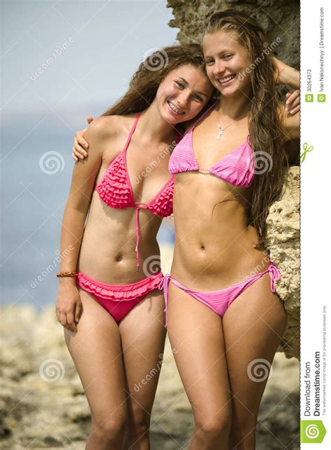 two girls in bikinis stock image image of enjoyment