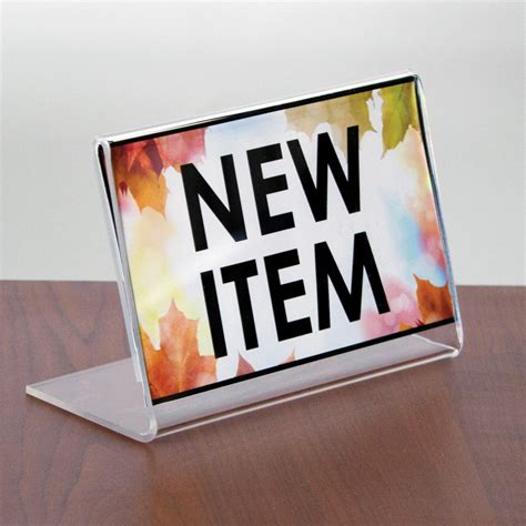 acrylic slanted sign holder        specialty store services