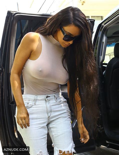 Kim Kardashian Goes Braless In Miami Wearing A Top Aznude