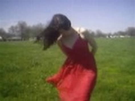 open field wind blowing dress  hair  windy flies standing