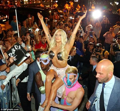 Lady Gaga Arrives In Athens In A Thong And Seashell Bra
