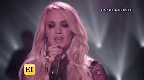carrie underwood breaks down in tears in first music video after face