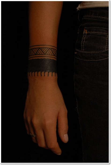 29 Solid Wristband Tattoos Designs