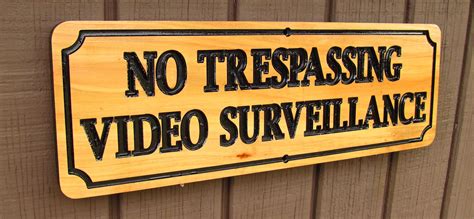 no trespassing video surveillance carved cedar wood sign