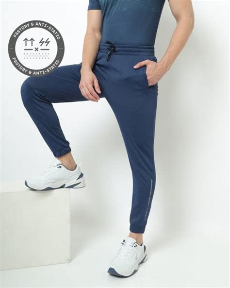 buy quick dry cuffed track pants  placement print    prices  india jiomart