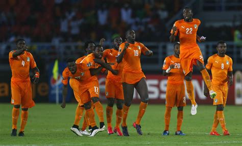 ivory coast s players celebrate winning the african