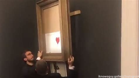 banksy artwork  destructs moment   million sale  sotheby