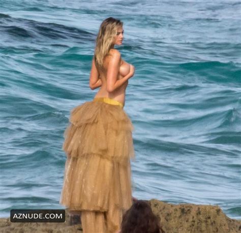 Kate Upton Falls During Topless Photoshoot For Sports Illustrated 2018