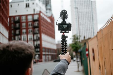 young correspondent recording video  city  stock photo