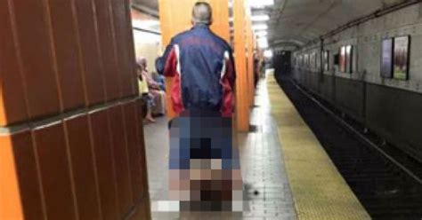 woman performs sex act on man in front of shocked passengers on subway platform mirror online