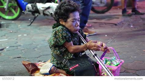 woman dwarf at walking street in pattaya thailand stock