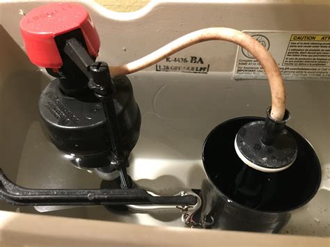 toilet  making  hissing noise   fill valve red   doesnt stop