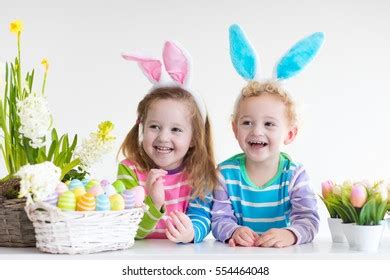 happy children celebrate easter home boy stock photo