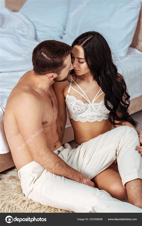 Handsome Sexy Man Hugging Kissing Beautiful Woman Lace Bra Bedroom