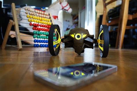 toy cars sitting  top   wooden floor    iphone  toys